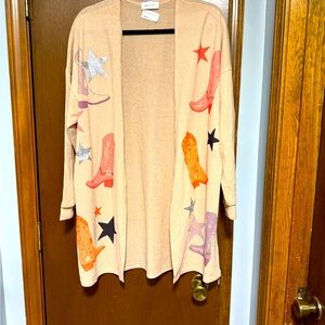 Playful Beige Cardigan with Star and Boot Accents